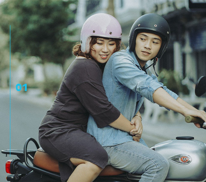 Japanese couple on motor bike
